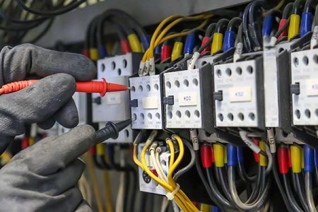 Electrician-With-Gloves-Testing Electrician-With-Gloves-Testing